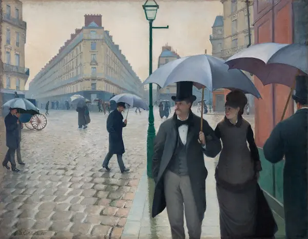 rainy day with people walking with umbrellas