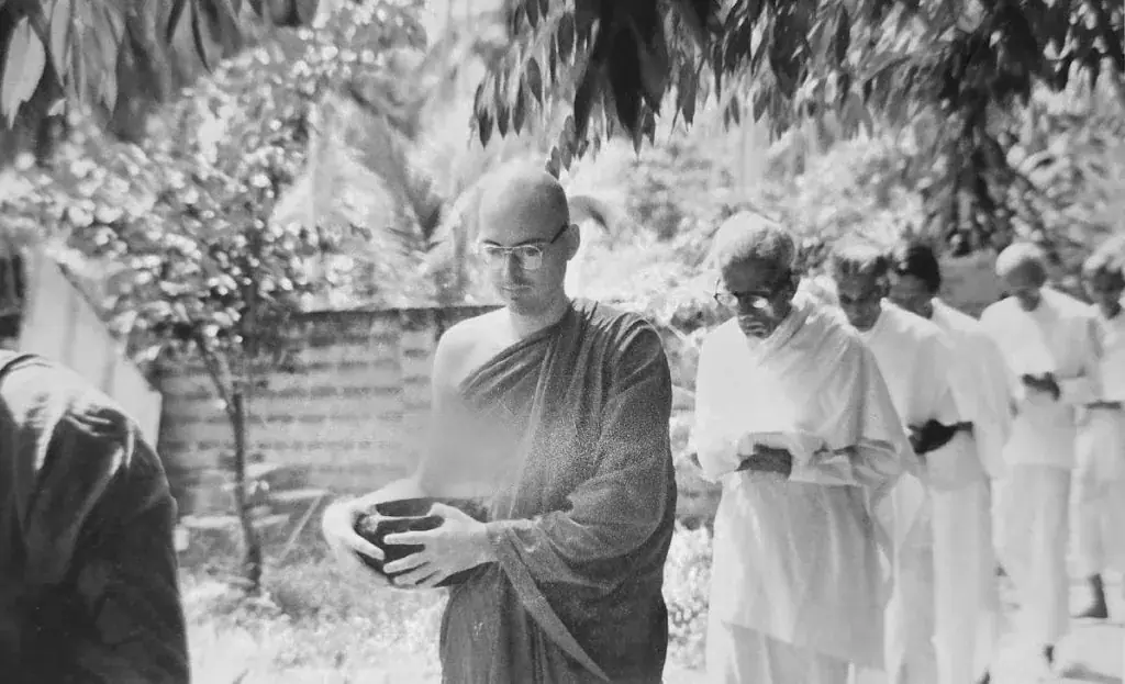 Tom Davidson-Marx as a Theravada monk, carrying an alms bowl in Sri Lanka, 1980s.